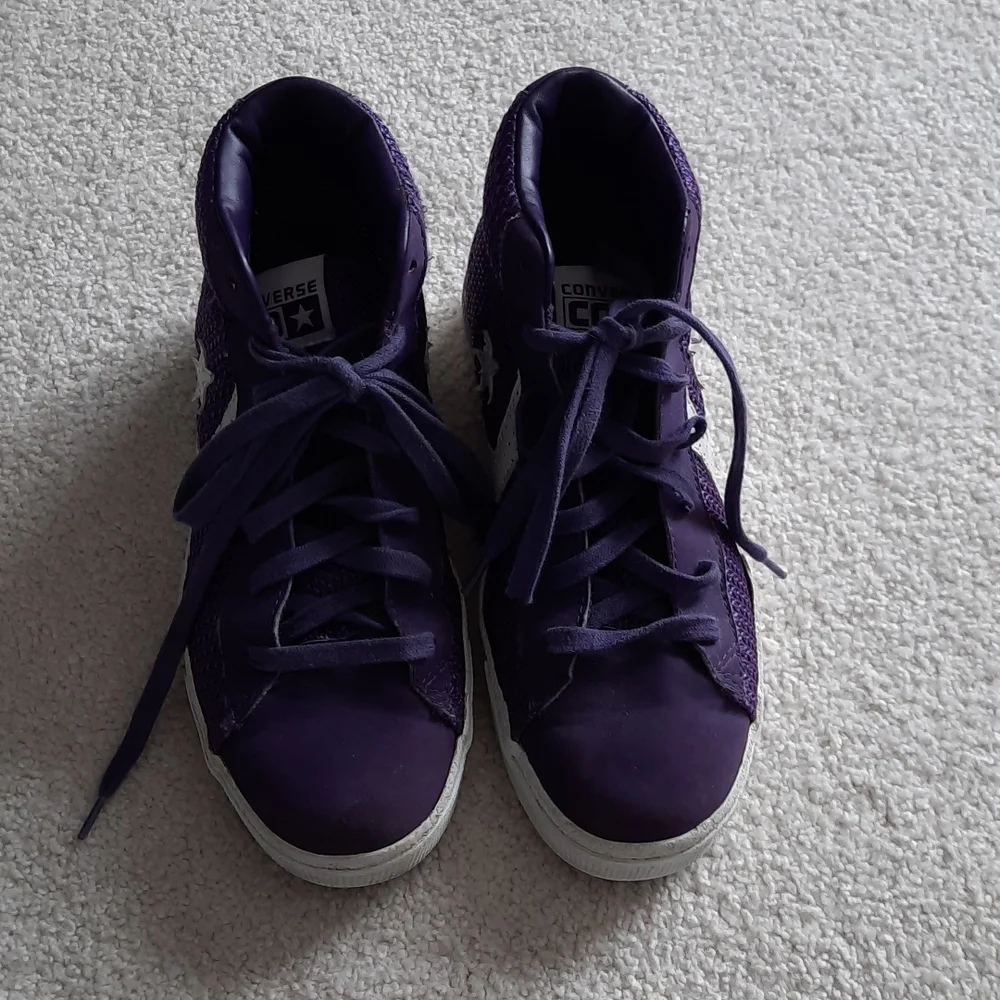 3 For $30. 24. Purple and white converse mid-top seankers.